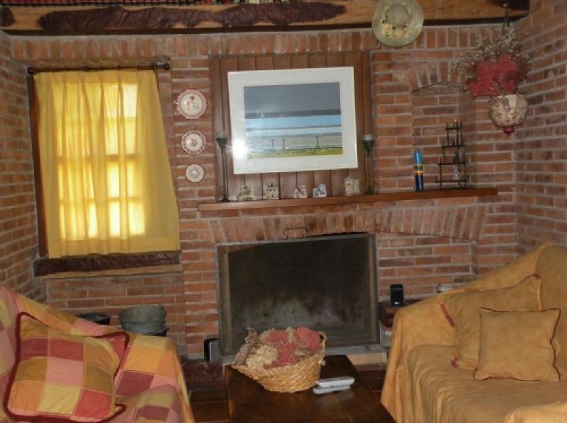 LIVING INTIMO CON HOGAR